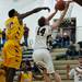 Dexter junior Brandon Bednarz tries to score in the second half against Ypsilanti on Friday, Feb. 15. Daniel Brenner I AnnArbor.com